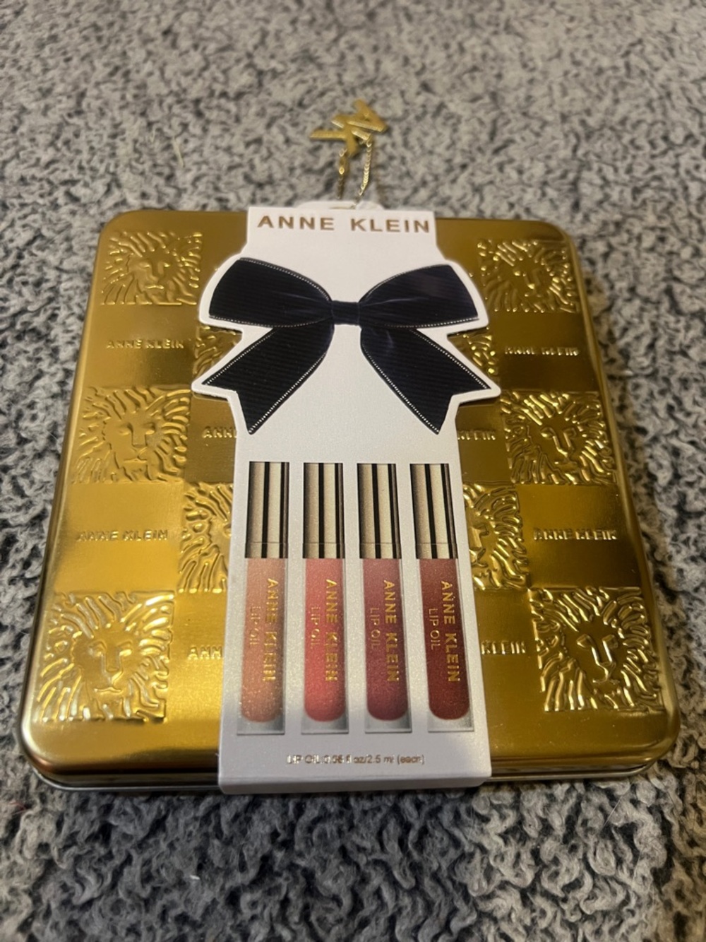 Anne Klein Gold Tin Lip Oil Set with Neutral Pink and Rose Shades
